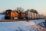 BNSF 7549 Heads EB with a all Jb hunt stack train.